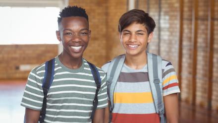 Two smiling adolescent boys
